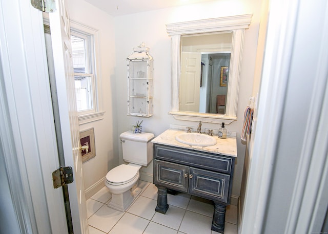 6 Rogers Dr, Stonington, CT 06355 - half bathroom with tile patterned flooring, toilet, vanity, and baseboards