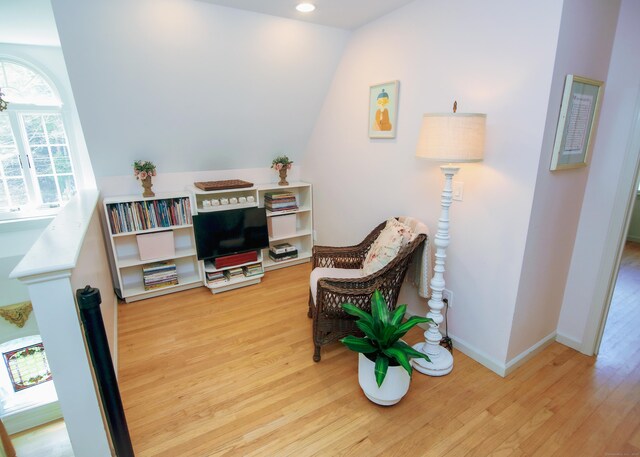 6 Rogers Dr, Stonington, CT 06355 - sitting room featuring wood finished floors, baseboards, lofted ceiling, and recessed lighting