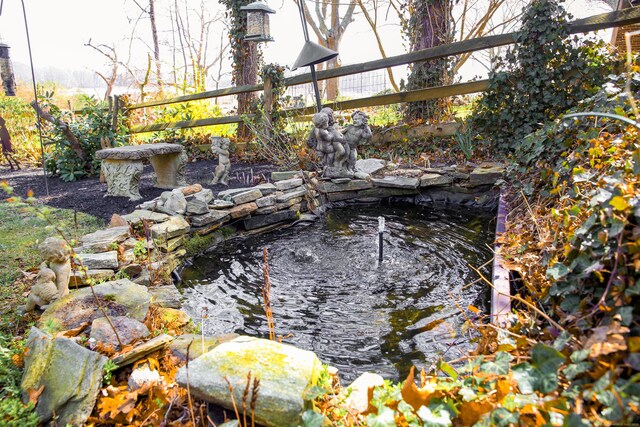 6 Rogers Dr, Stonington, CT 06355 - exterior view of a small pond