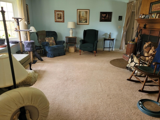 38 Somerset Dr, Manchester, CT 06040 - living area featuring carpet, a brick fireplace, and baseboards