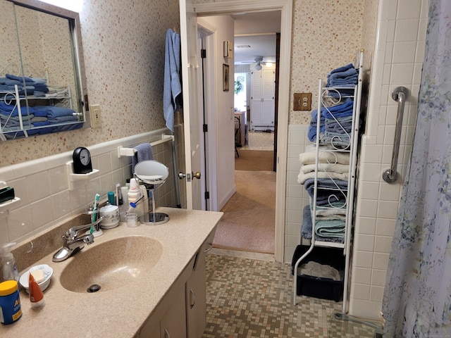 38 Somerset Dr, Manchester, CT 06040 - bathroom featuring wallpapered walls, wainscoting, vanity, curtained shower, and ceiling fan