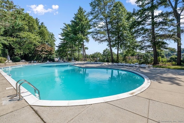 community pool with a patio