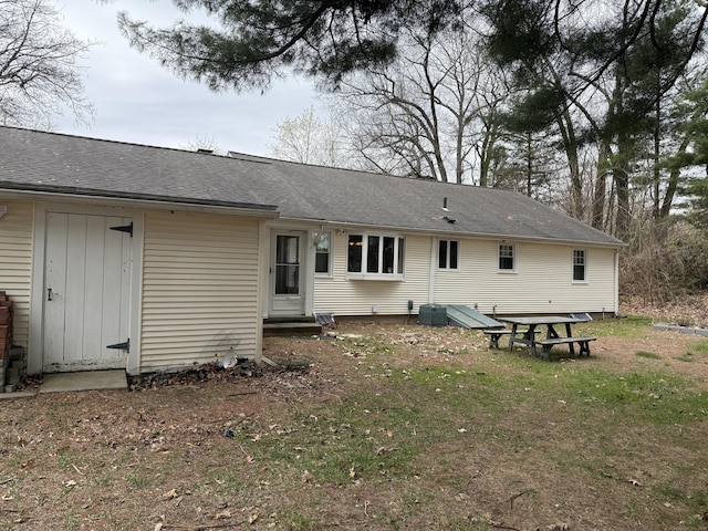 278 Dudley Town Rd, Windsor, CT 06095 - rear view of property featuring entry steps, central AC, and a shingled roof