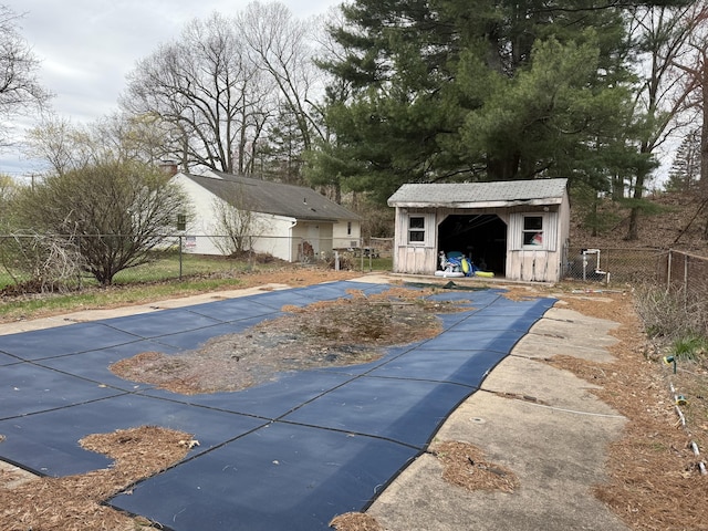 278 Dudley Town Rd, Windsor, CT 06095 - view of swimming pool featuring fence, a shed, and an outbuilding