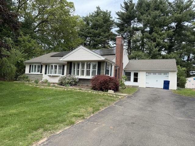 278 Dudley Town Rd, Windsor, CT 06095 - ranch-style home featuring a garage, a chimney, driveway, and a front yard
