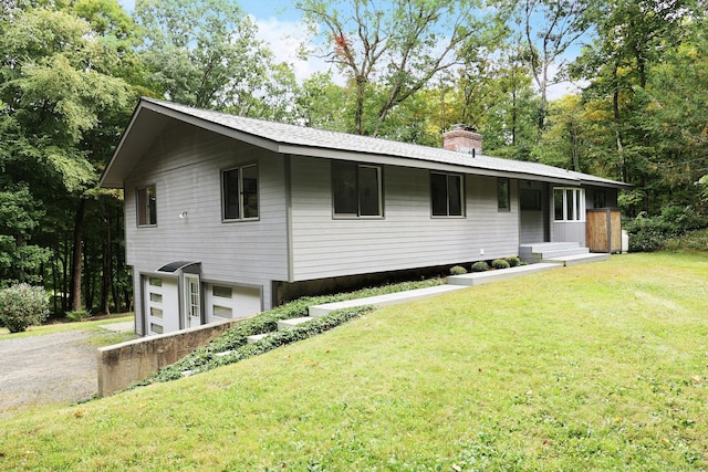 45 Wayside Ln, Redding, CT 06896 - view of front of home with driveway, a chimney, a garage, a front lawn, and roof with shingles