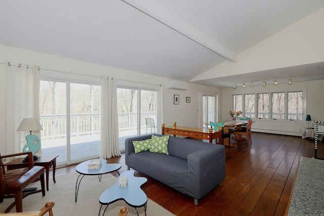 45 Wayside Ln, Redding, CT 06896 - living room featuring a baseboard heating unit, hardwood / wood-style floors, a wall unit AC, and plenty of natural light