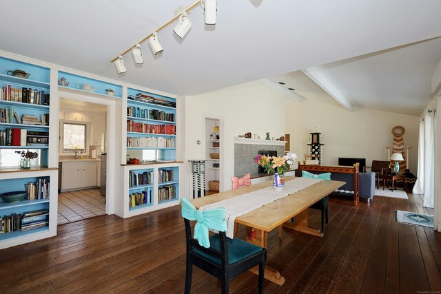 45 Wayside Ln, Redding, CT 06896 - dining area featuring wood-type flooring and built in shelves