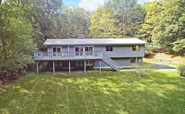 45 Wayside Ln, Redding, CT 06896 - rear view of property with a wooden deck, stairs, a yard, a chimney, and a wooded view