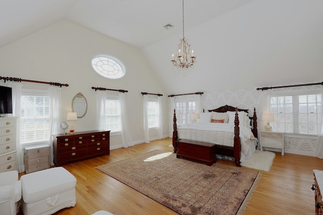 37 Giles Hill Rd, Redding, CT 06896 - bedroom featuring high vaulted ceiling, visible vents, an inviting chandelier, and light wood-style flooring