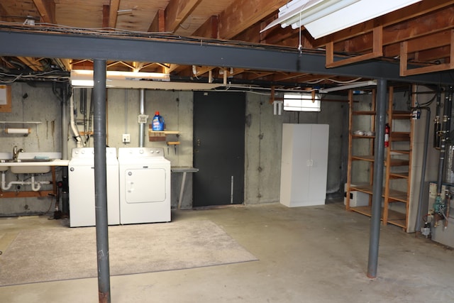 1 Sunrise Cir, Enfield, CT 06082 - basement with washing machine and dryer and a sink