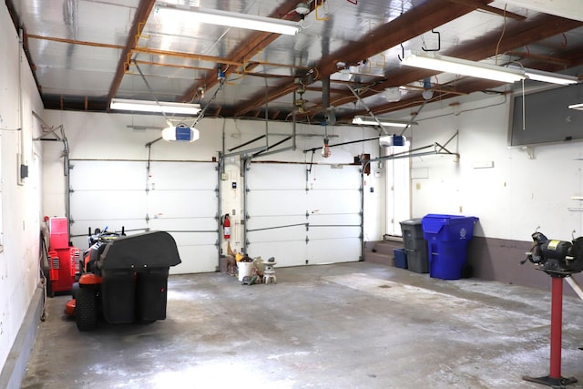 1 Sunrise Cir, Enfield, CT 06082 - garage featuring a garage door opener