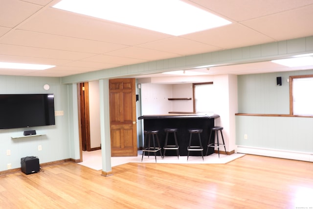 1 Sunrise Cir, Enfield, CT 06082 - indoor dry bar with wood finished floors and a baseboard heating unit