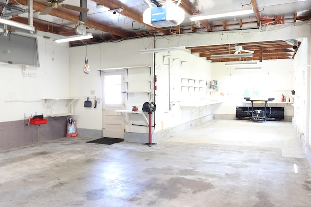 1 Sunrise Cir, Enfield, CT 06082 - garage with a workshop area and a garage door opener
