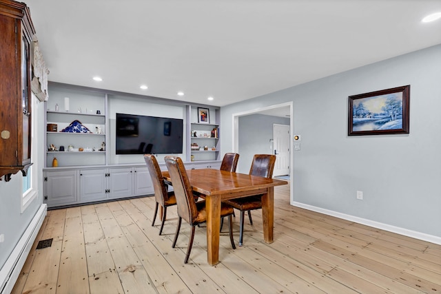 15 Briarwood Dr, Guilford, CT 06437 - dining area with a baseboard heating unit, light wood finished floors, recessed lighting, and built in features
