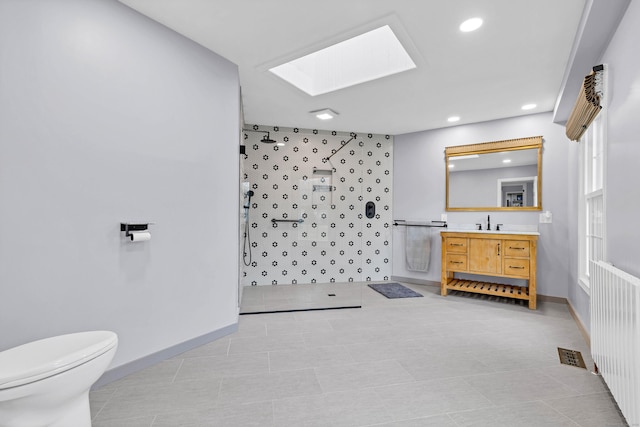 15 Briarwood Dr, Guilford, CT 06437 - full bath with a skylight, a tile shower, vanity, recessed lighting, and tile patterned floors