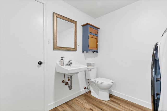 15 Briarwood Dr, Guilford, CT 06437 - half bath with baseboards and wood finished floors
