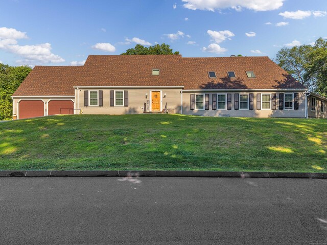 15 Briarwood Dr, Guilford, CT 06437 - view of front of home with a garage and a front lawn