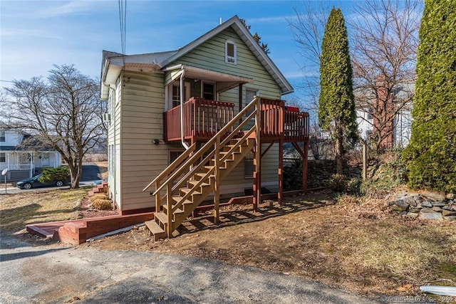 26 Columbia St, Ansonia, CT 06401 - view of front of property with a deck and stairway