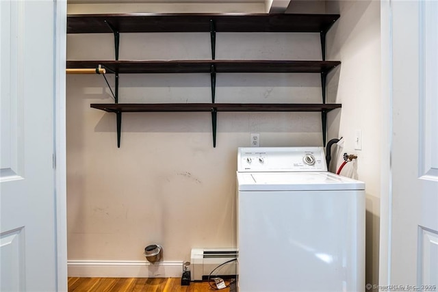 26 Columbia St, Ansonia, CT 06401 - washroom featuring baseboards, laundry area, baseboard heating, wood finished floors, and washer / dryer