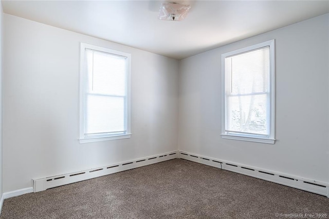 26 Columbia St, Ansonia, CT 06401 - carpeted spare room with baseboard heating