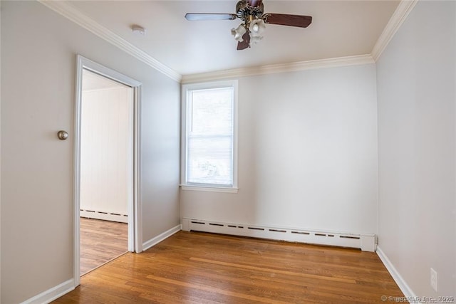 26 Columbia St, Ansonia, CT 06401 - unfurnished room with baseboard heating, wood finished floors, ornamental molding, and a ceiling fan