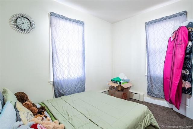 26 Columbia St, Ansonia, CT 06401 - bedroom with a baseboard radiator, multiple windows, and carpet flooring