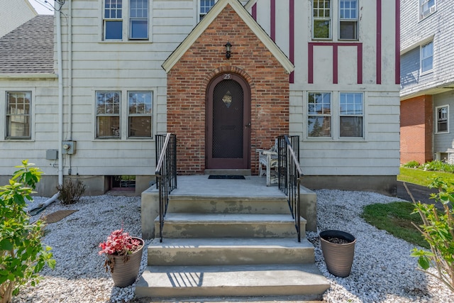 25 S Highland St, West Hartford, CT 06119 - entrance to property with brick siding and roof with shingles