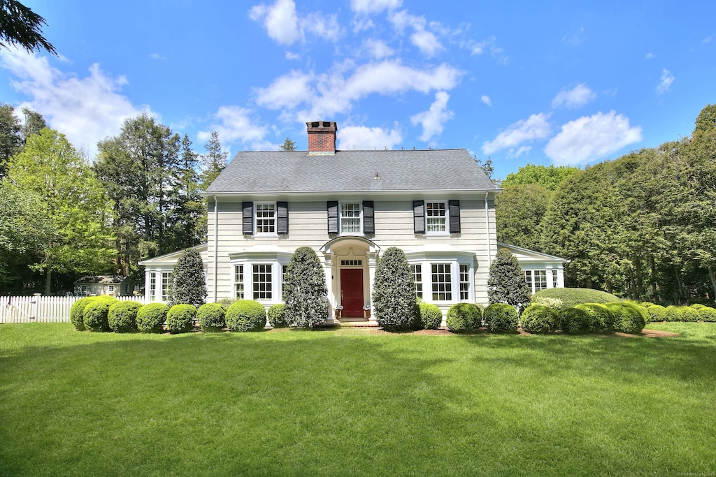 27 Old Hill Farms Rd, Westport, CT 06880 - colonial inspired home featuring a chimney