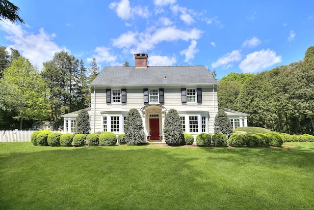 27 Old Hill Farms Rd, Westport, CT 06880 - colonial inspired home featuring a chimney