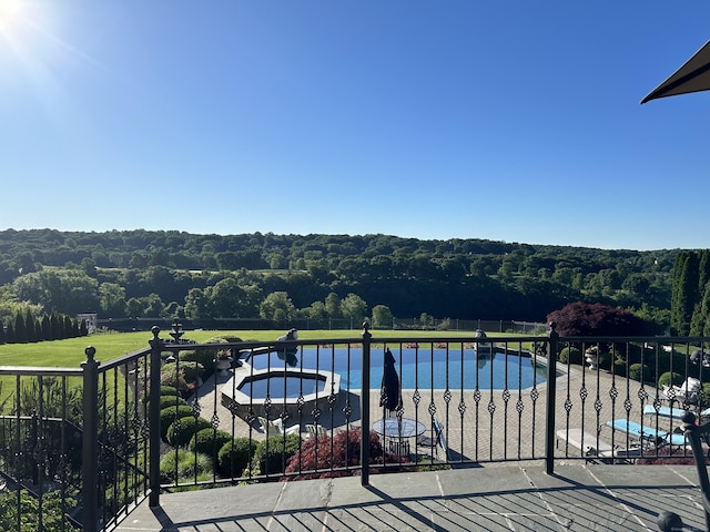 22 Nature Ln, Shelton, CT 06484 - view of swimming pool with a wooded view, fence, and a patio