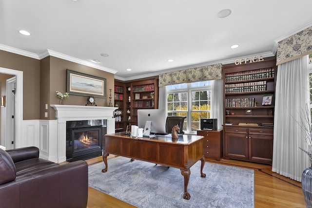 22 Nature Ln, Shelton, CT 06484 - office area featuring light wood-type flooring, crown molding, a premium fireplace, and recessed lighting