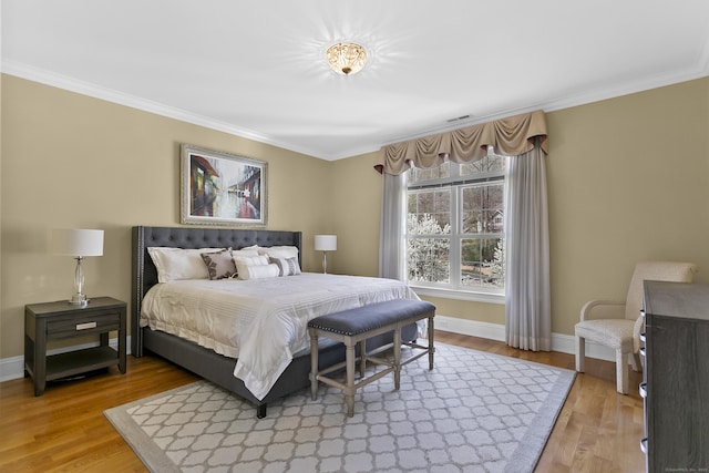 22 Nature Ln, Shelton, CT 06484 - bedroom with ornamental molding, light wood finished floors, and baseboards