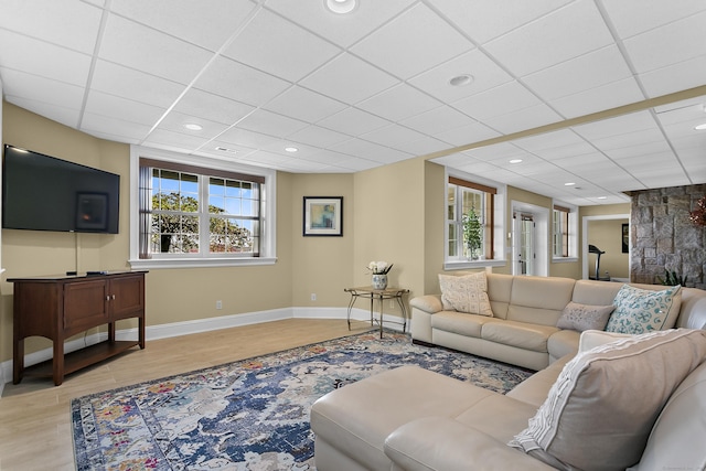 22 Nature Ln, Shelton, CT 06484 - living room with light wood finished floors, a paneled ceiling, and recessed lighting