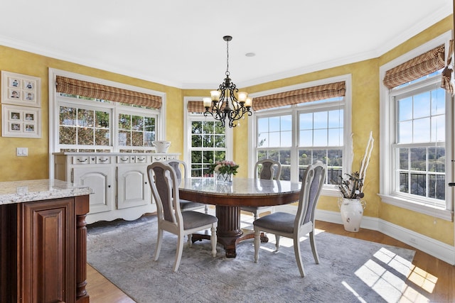 22 Nature Ln, Shelton, CT 06484 - dining space featuring a chandelier, light wood finished floors, and ornamental molding