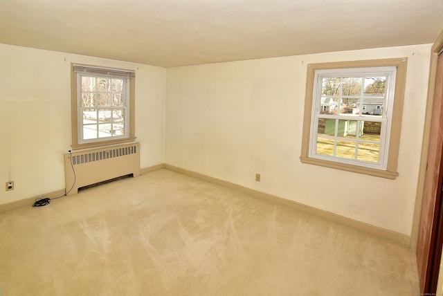 88 Milwood Rd, East Hartford, CT 06118 - unfurnished room with light carpet, baseboards, and radiator