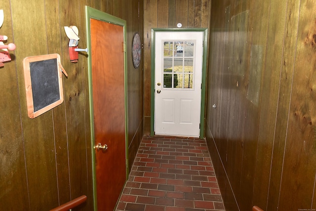 88 Milwood Rd, East Hartford, CT 06118 - doorway with brick floor and wooden walls