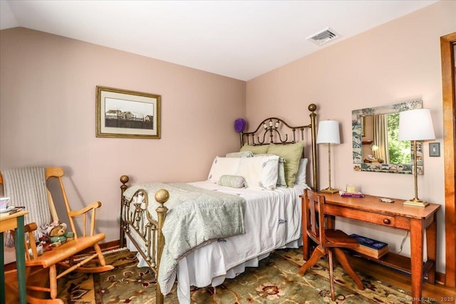 bedroom with lofted ceiling