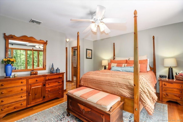 bedroom featuring light wood-style flooring and ceiling fan