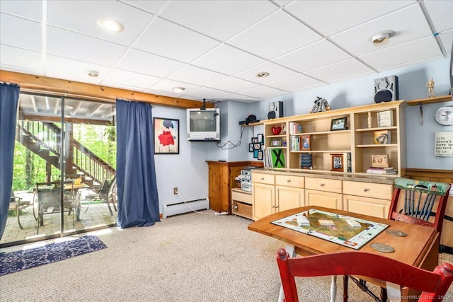 game room with a baseboard heating unit, light carpet, a paneled ceiling, and recessed lighting