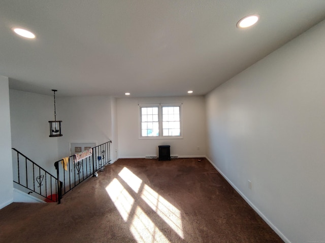 interior space featuring recessed lighting, carpet floors, and baseboards