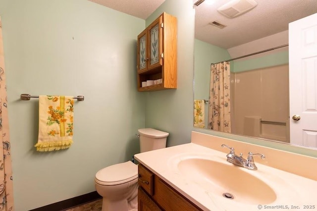 443 Lakeview Dr Unit 443, Southington, CT 06489 - full bathroom featuring toilet, vanity, a shower with curtain, and a textured ceiling