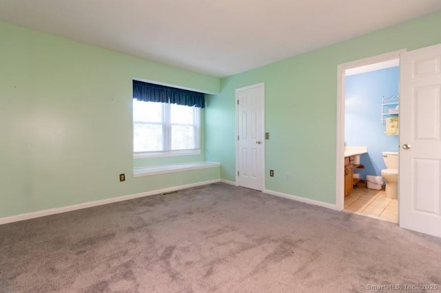 443 Lakeview Dr Unit 443, Southington, CT 06489 - unfurnished bedroom with carpet flooring, ensuite bathroom, and baseboards