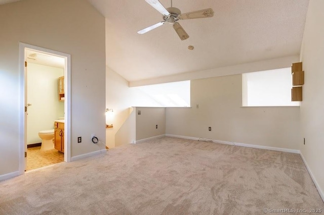 443 Lakeview Dr Unit 443, Southington, CT 06489 - empty room featuring vaulted ceiling, carpet floors, a ceiling fan, and baseboards