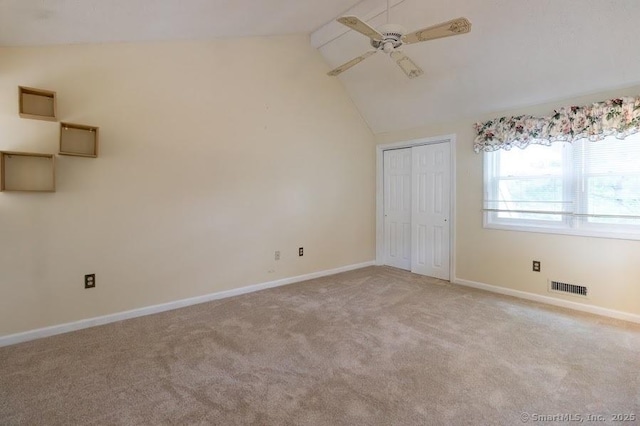443 Lakeview Dr Unit 443, Southington, CT 06489 - unfurnished bedroom with carpet flooring, vaulted ceiling, baseboards, a closet, and a ceiling fan