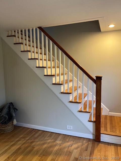 12 Homecrest St, Newington, CT 06111 - stairway with wood finished floors, baseboards, and recessed lighting