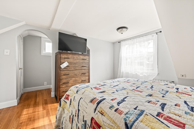 12 Homecrest St, Newington, CT 06111 - bedroom featuring arched walkways and light wood-style flooring