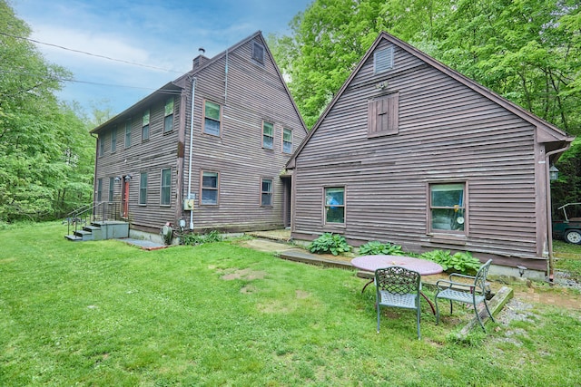 581 Oxford Rd, Oxford, CT 06478 - back of property featuring a yard and a chimney
