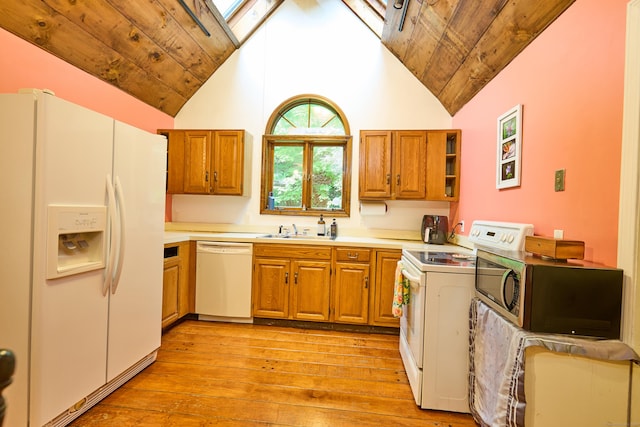 581 Oxford Rd, Oxford, CT 06478 - kitchen with white appliances, a sink, a skylight, brown cabinets, and wood ceiling