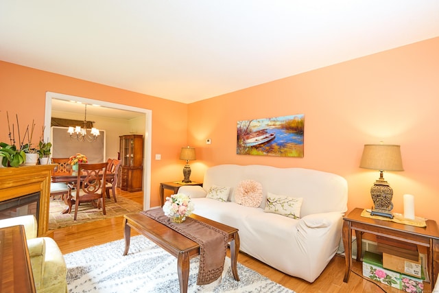 581 Oxford Rd, Oxford, CT 06478 - living area featuring light wood-style flooring and a chandelier